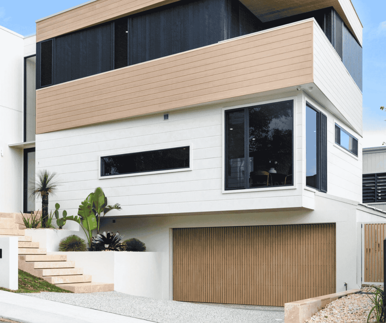 new garage doors brisbane Custom bespoke garage door design installed for a modern Brisbane home